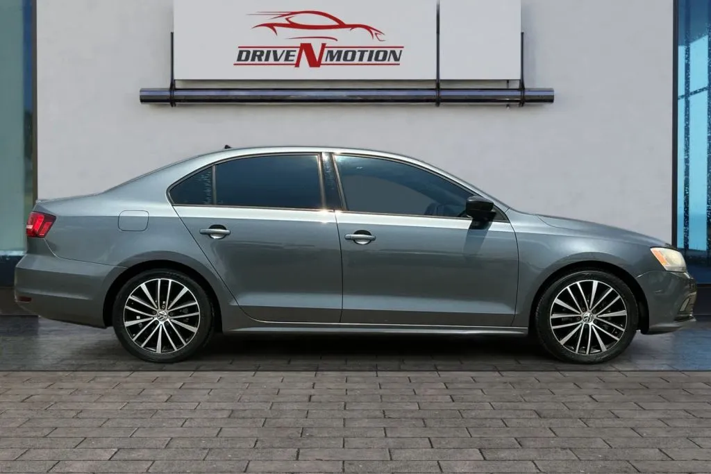Another view of 2015 Volkswagen Jetta 1.8T Sport Sedan 4D for sale in Greeley, CO at Drive N-Motion Greeley