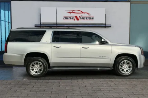 Another view of 2017 GMC Yukon XL SLT Sport Utility 4D for sale in Greeley, CO at Drive N-Motion Greeley