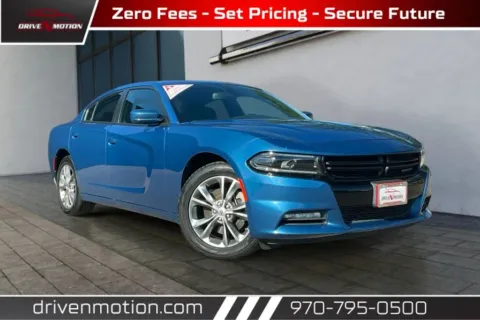 Blue 2022 Dodge Charger SXT Sedan 4D for sale in Greeley, CO