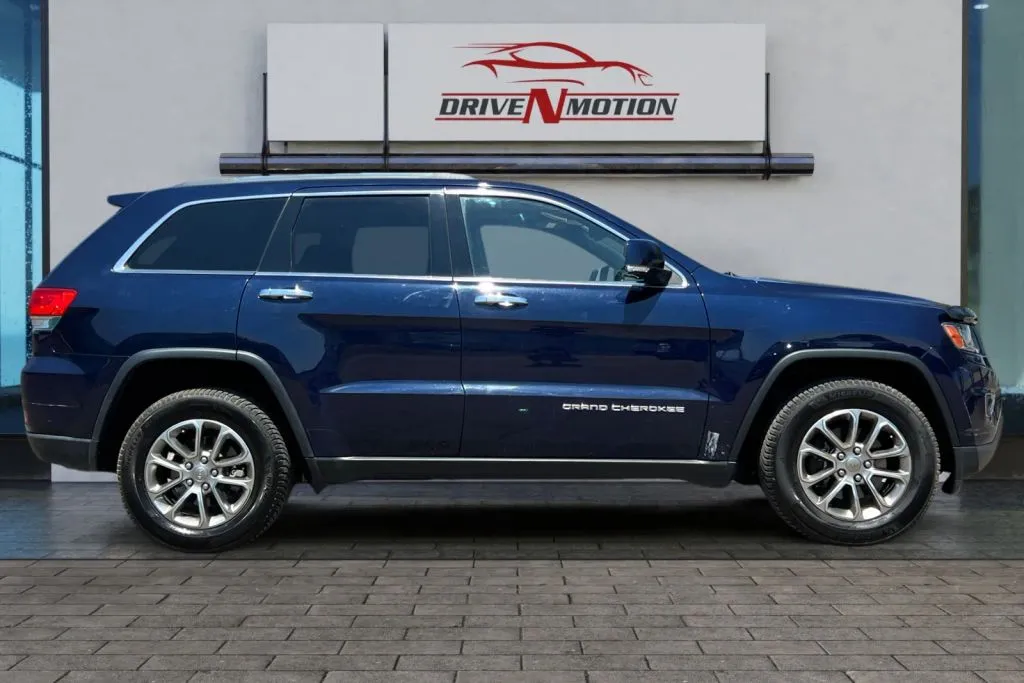 Another view of 2014 Jeep Grand Cherokee Limited Sport Utility 4D for sale in Greeley, CO at Drive N-Motion Greeley