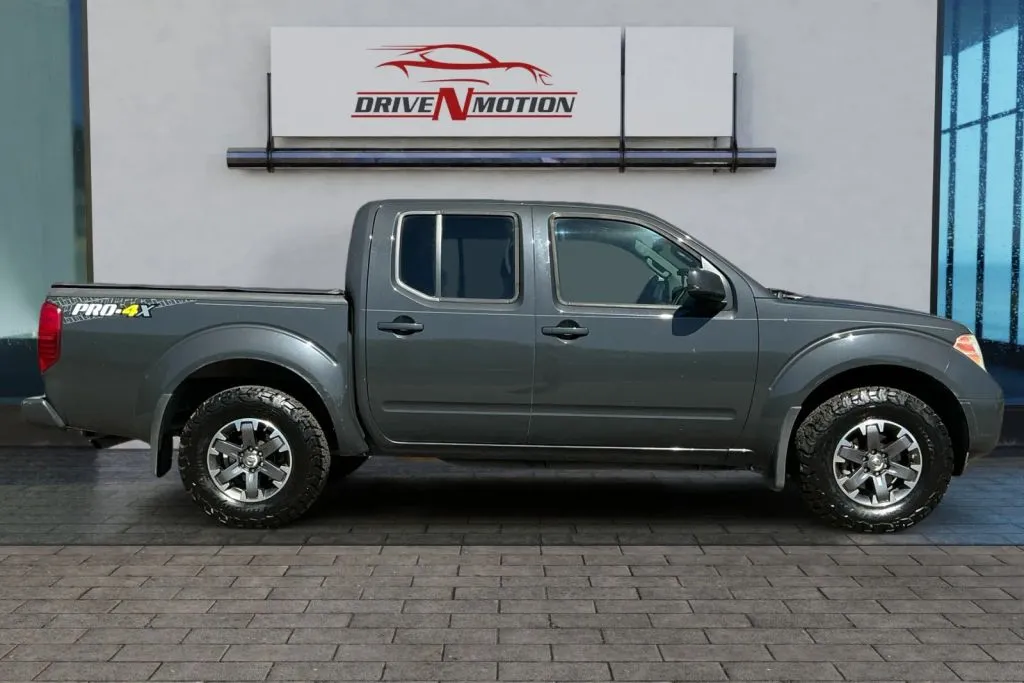 Another view of 2014 Nissan Frontier Crew Cab PRO-4X Pickup 4D 5 ft for sale in Greeley, CO at Drive N-Motion Greeley
