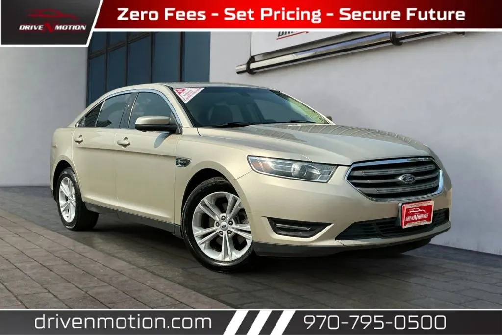 Gold 2018 Ford Taurus SEL Sedan 4D for sale in Greeley, CO