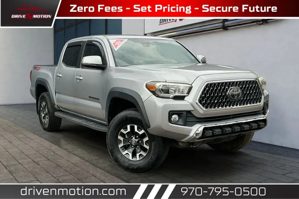 Silver 2018 Toyota Tacoma Double Cab TRD Off-Road Pickup 4D 5 ft for sale in Greeley, CO