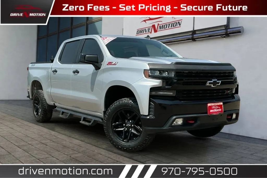 Silver 2020 Chevrolet Silverado 1500 Crew Cab LT Trail Boss Pickup 4D 5 3/4 ft for sale in Greeley, CO