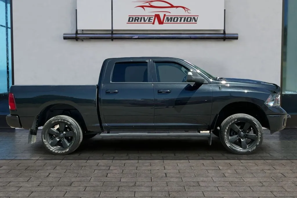 Another view of 2018 Ram 1500 Crew Cab SLT Pickup 4D 5 1/2 ft for sale in Greeley, CO at Drive N-Motion Greeley