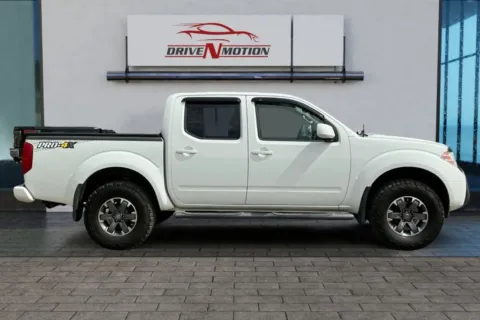 Another view of 2015 Nissan Frontier Crew Cab PRO-4X Pickup 4D 5 ft for sale in Greeley, CO at Drive N-Motion Greeley