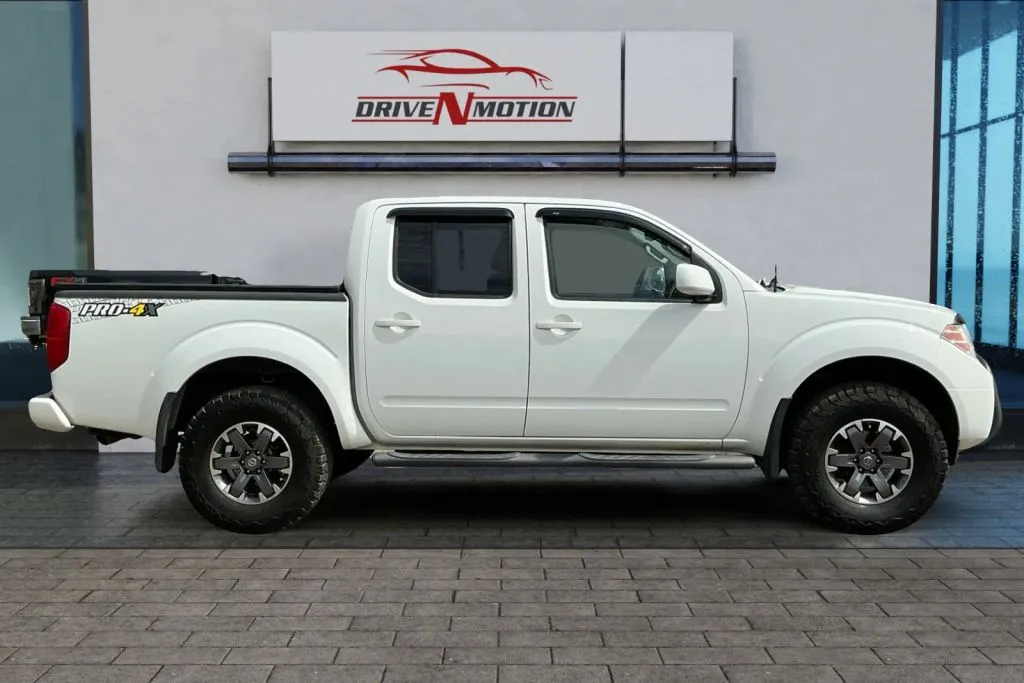 Another view of 2015 Nissan Frontier Crew Cab PRO-4X Pickup 4D 5 ft for sale in Greeley, CO at Drive N-Motion Greeley