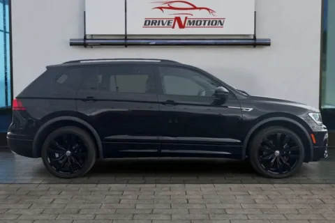 Photos of 2021 Volkswagen Tiguan SE R-Line Black Sport Utility 4D for sale in Greeley, CO at Drive N-Motion Greeley
