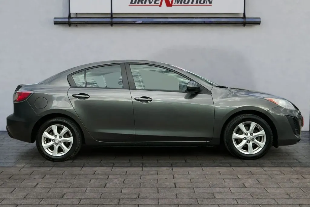 Another view of 2011 MAZDA MAZDA3 i Touring Sedan 4D for sale in Greeley, CO at Drive N-Motion Greeley