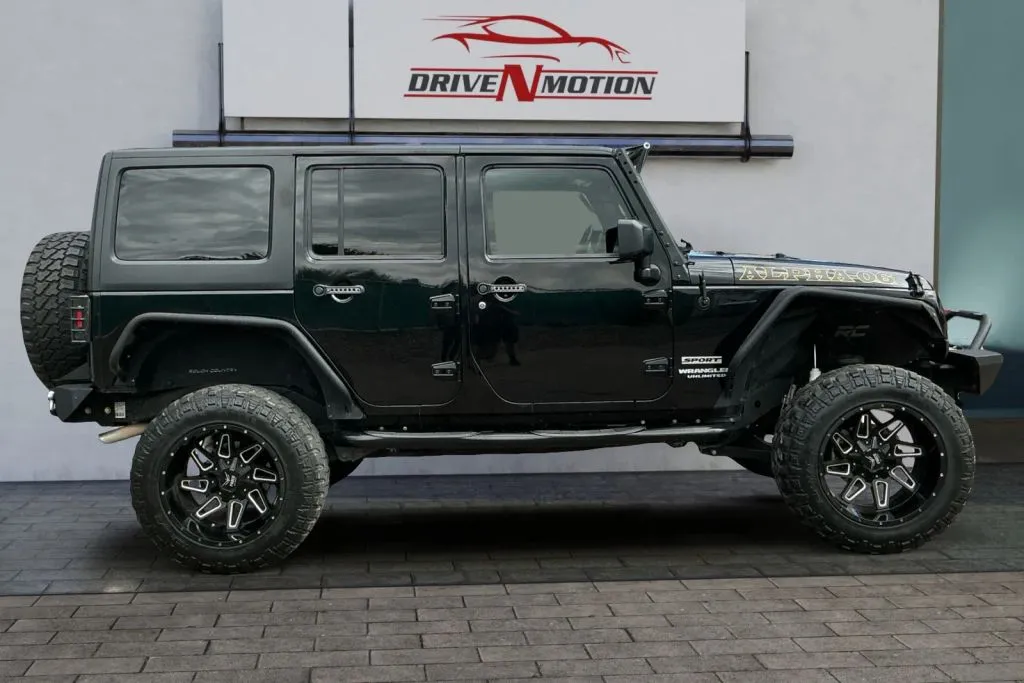 Another view of 2016 Jeep Wrangler Unlimited Sport S Sport Utility 4D for sale in Greeley, CO at Drive N-Motion Greeley