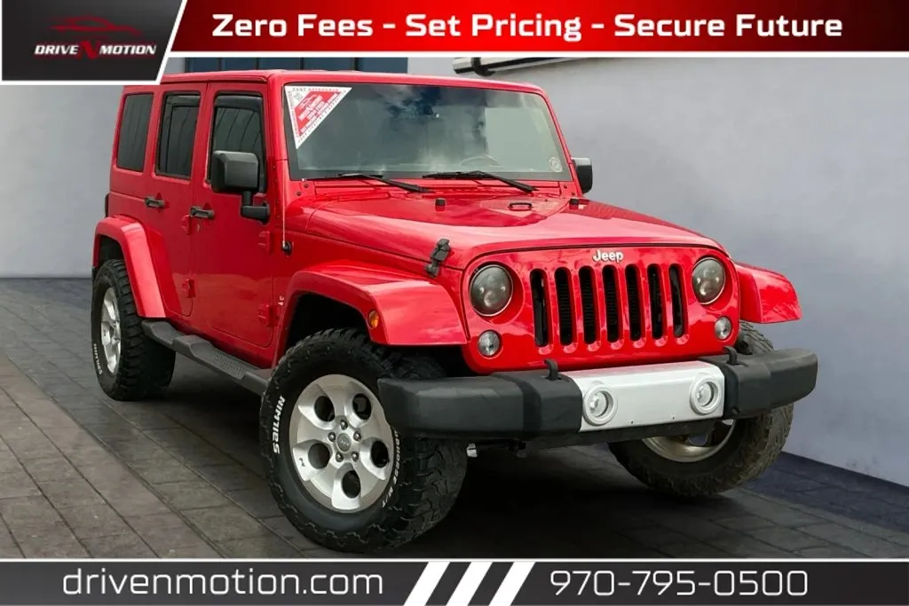 Red 2015 Jeep Wrangler Unlimited Sahara Sport Utility 4D for sale in Greeley, CO