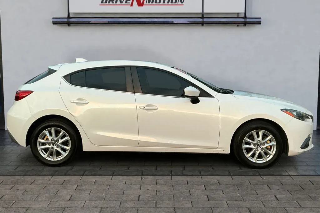 Another view of 2015 MAZDA MAZDA3 i Touring Hatchback 4D for sale in Greeley, CO at Drive N-Motion Greeley