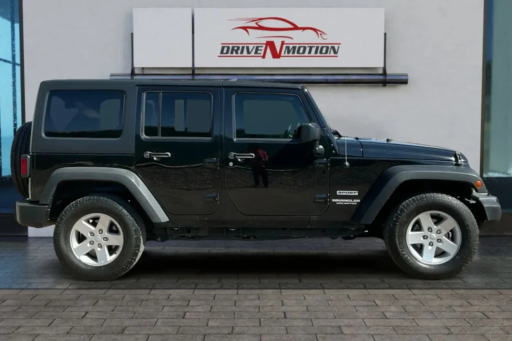 Another view of 2017 Jeep Wrangler Unlimited Sport SUV 4D for sale in Greeley, CO at Drive N-Motion Greeley