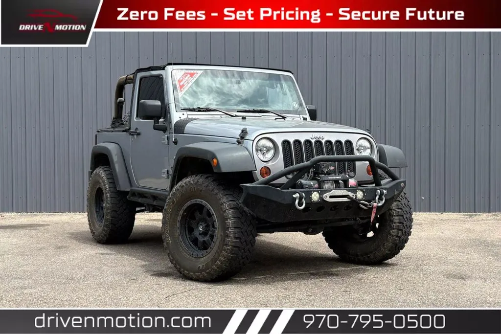 Silver 2013 Jeep Wrangler Sport SUV 2D for sale in Greeley, CO