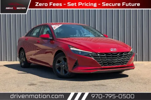 Red 2022 Hyundai Elantra Blue HEV Sedan 4D for sale in Greeley, CO