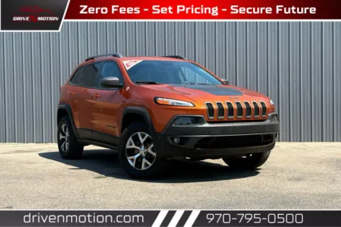 Orange 2015 Jeep Cherokee TrailHawk Sport Utility 4D for sale in Greeley, CO