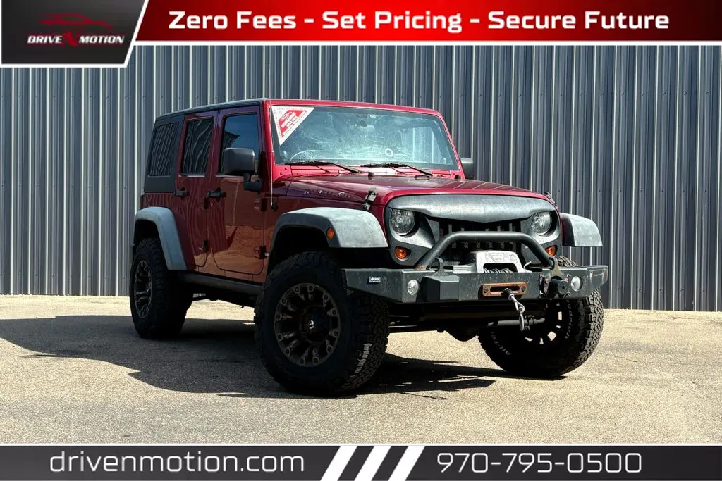 Red 2011 Jeep Wrangler Unlimited Rubicon Sport Utility 4D for sale in Greeley, CO