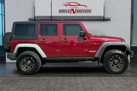 Another view of 2011 Jeep Wrangler Unlimited Rubicon Sport Utility 4D for sale in Greeley, CO at Drive N-Motion Greeley