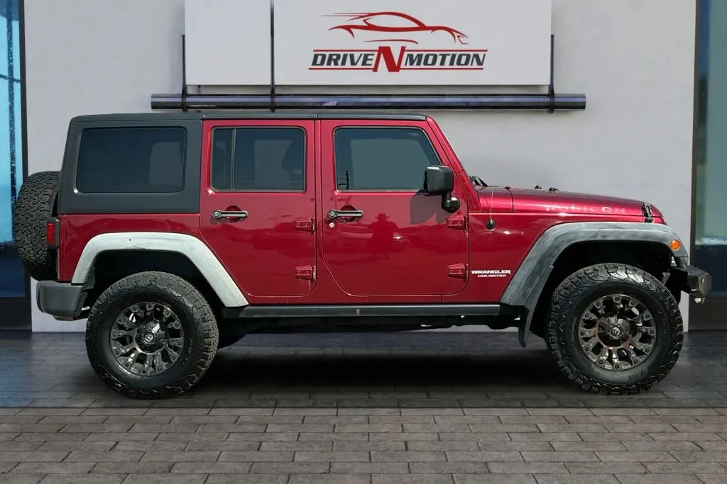 Another view of 2011 Jeep Wrangler Unlimited Rubicon Sport Utility 4D for sale in Greeley, CO at Drive N-Motion Greeley