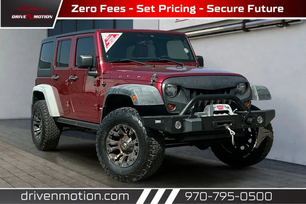 Red 2011 Jeep Wrangler Unlimited Rubicon Sport Utility 4D for sale in Greeley, CO