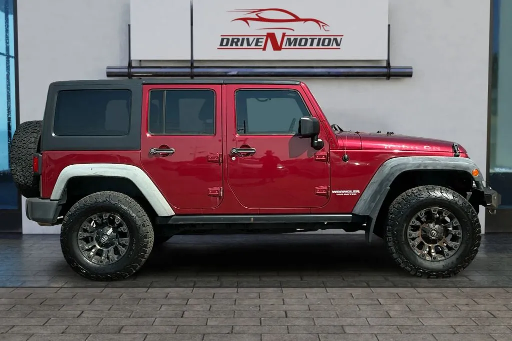 Photos of 2011 Jeep Wrangler Unlimited Rubicon Sport Utility 4D for sale in Greeley, CO at Drive N-Motion Greeley