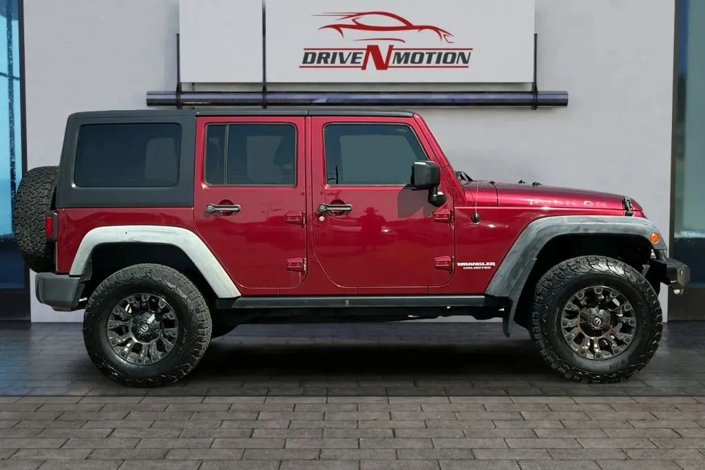 Another view of 2011 Jeep Wrangler Unlimited Rubicon Sport Utility 4D for sale in Greeley, CO at Drive N-Motion Greeley