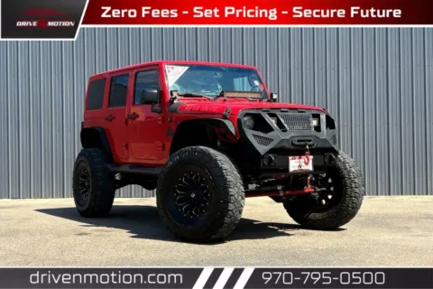 Red 2017 Jeep Wrangler Unlimited Sahara Sport Utility 4D for sale in Greeley, CO