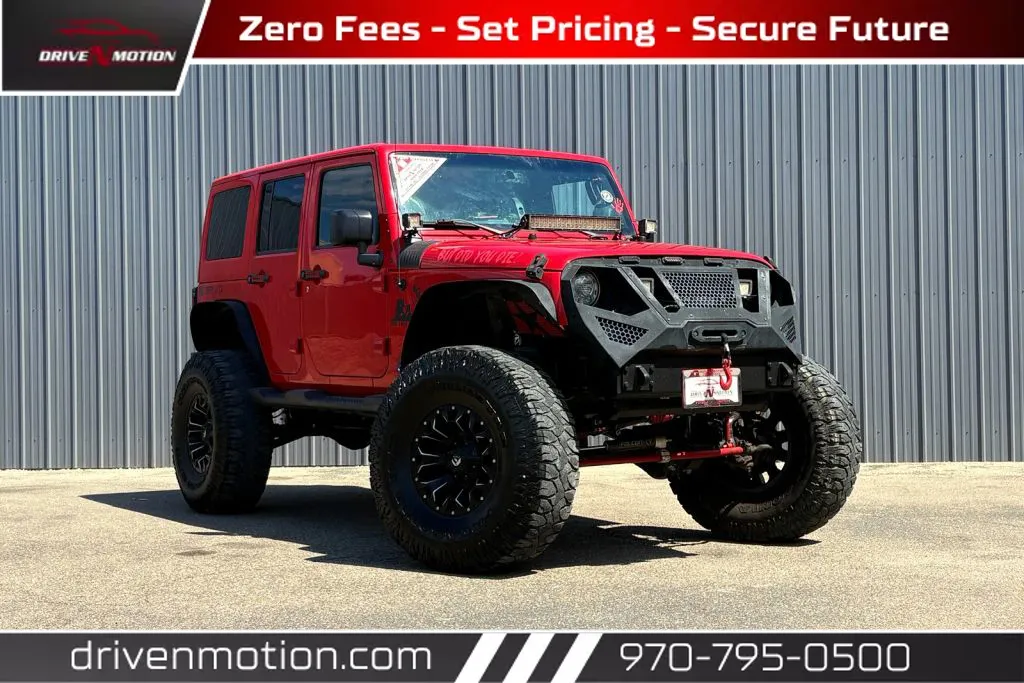Red 2017 Jeep Wrangler Unlimited Sahara Sport Utility 4D for sale in Greeley, CO