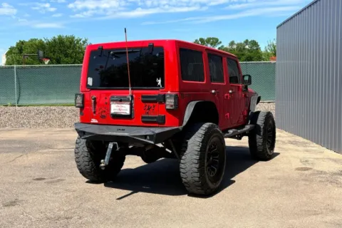 Another view of 2017 Jeep Wrangler Unlimited Sahara Sport Utility 4D for sale in Greeley, CO at Drive N-Motion Greeley