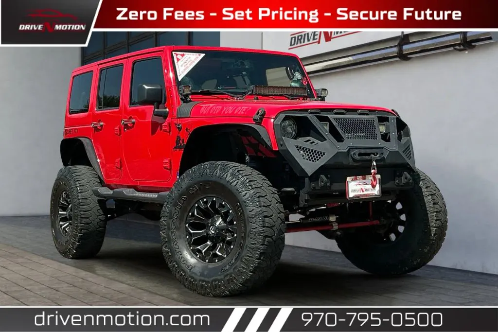 Red 2017 Jeep Wrangler Unlimited Sahara Sport Utility 4D for sale in Greeley, CO