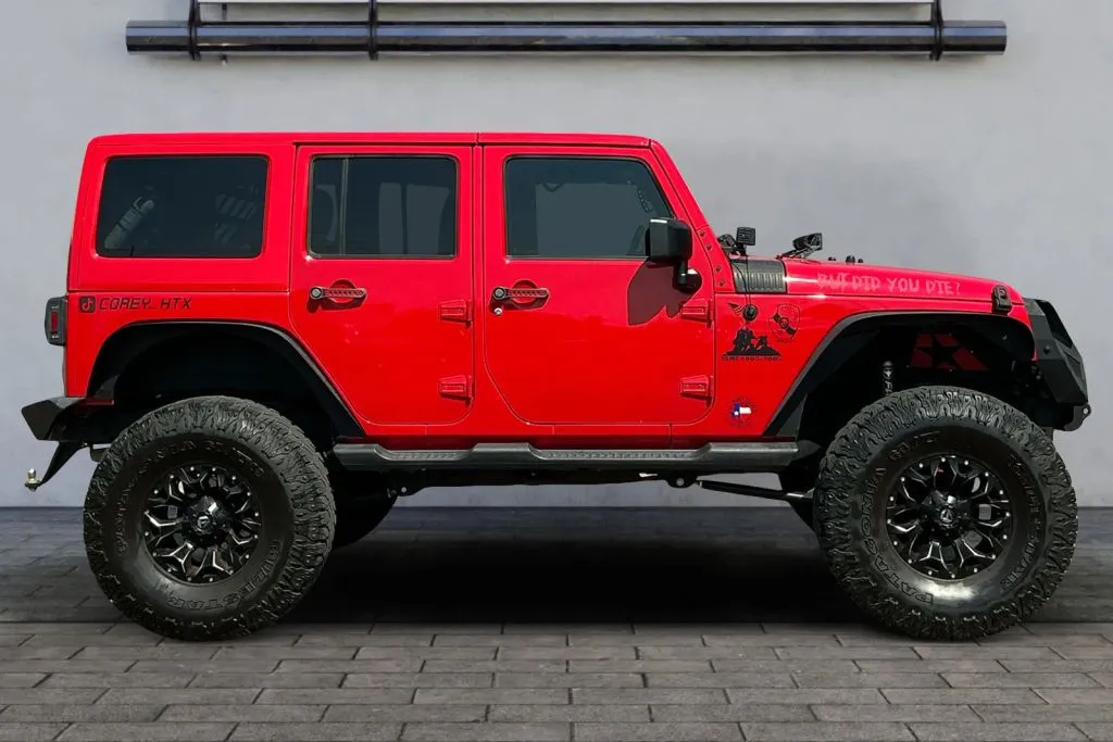 Photos of 2017 Jeep Wrangler Unlimited Sahara Sport Utility 4D for sale in Greeley, CO at Drive N-Motion Greeley