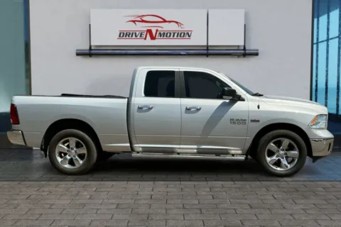 Photos of 2018 Ram 1500 Quad Cab Big Horn Pickup 4D 6 1/3 ft for sale in Greeley, CO at Drive N-Motion Greeley