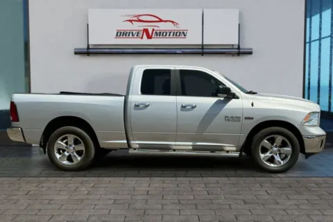 Photos of 2018 Ram 1500 Quad Cab Big Horn Pickup 4D 6 1/3 ft for sale in Greeley, CO at Drive N-Motion Greeley