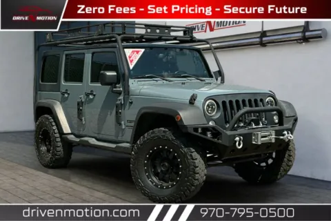 Gray 2014 Jeep Wrangler Unlimited Sport SUV 4D for sale in Greeley, CO