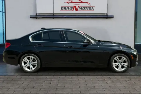 Another view of 2018 BMW 3 Series 330i xDrive Sedan 4D for sale in Greeley, CO at Drive N-Motion Greeley