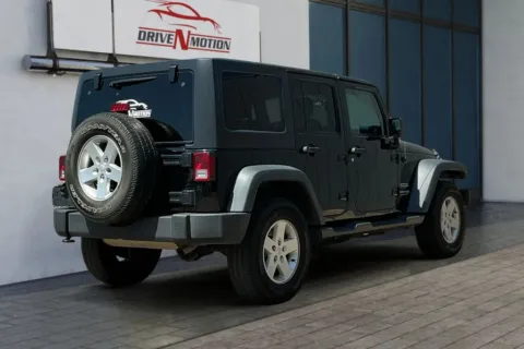 Another view of 2018 Jeep Wrangler Unlimited Sport S (JK) Sport Utility 4D for sale in Greeley, CO at Drive N-Motion Greeley