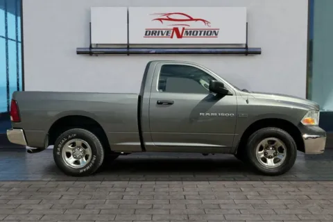 Photos of 2012 Ram 1500 Regular Cab Tradesman Pickup 2D 6 1/3 ft for sale in Greeley, CO at Drive N-Motion Greeley