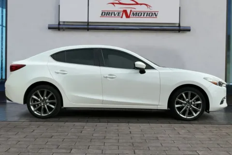 Photos of 2018 MAZDA MAZDA3 Touring Sedan 4D for sale in Greeley, CO at Drive N-Motion Greeley