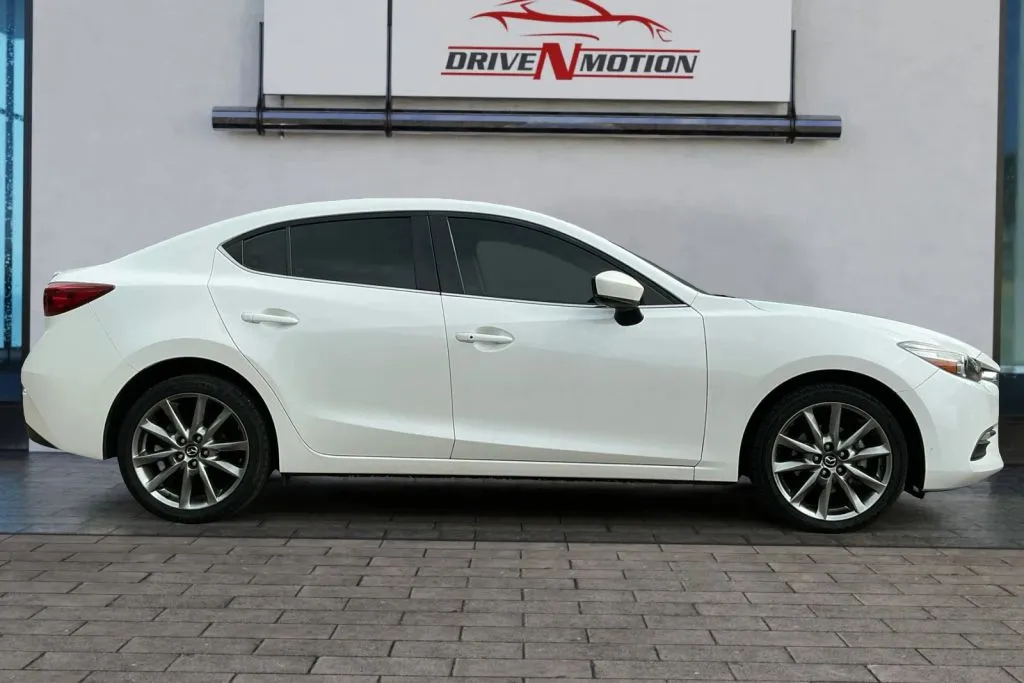 Photos of 2018 MAZDA MAZDA3 Touring Sedan 4D for sale in Greeley, CO at Drive N-Motion Greeley