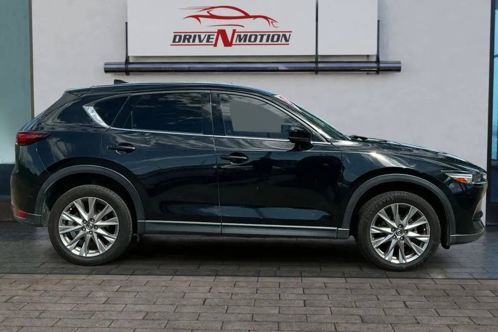 Another view of 2021 MAZDA CX-5 Grand Touring Sport Utility 4D for sale in Greeley, CO at Drive N-Motion Greeley