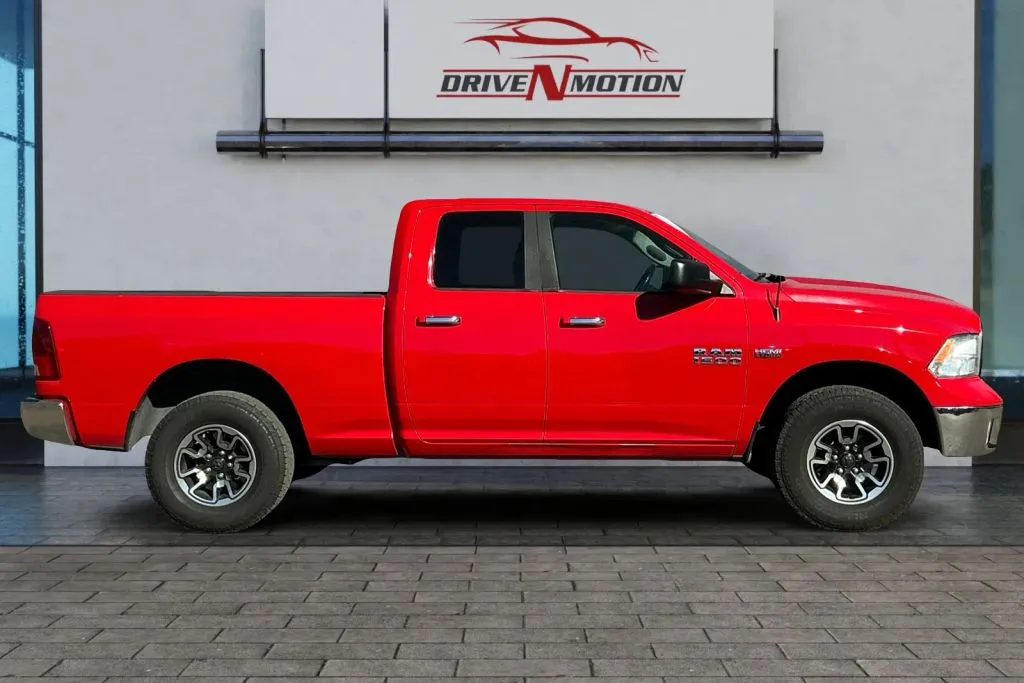 Another view of 2016 Ram 1500 Quad Cab Big Horn Pickup 4D 6 1/3 ft for sale in Greeley, CO at Drive N-Motion Greeley