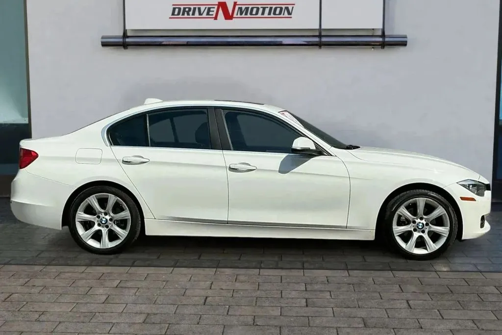 Another view of 2015 BMW 3 Series 320i xDrive Sedan 4D for sale in Greeley, CO at Drive N-Motion Greeley