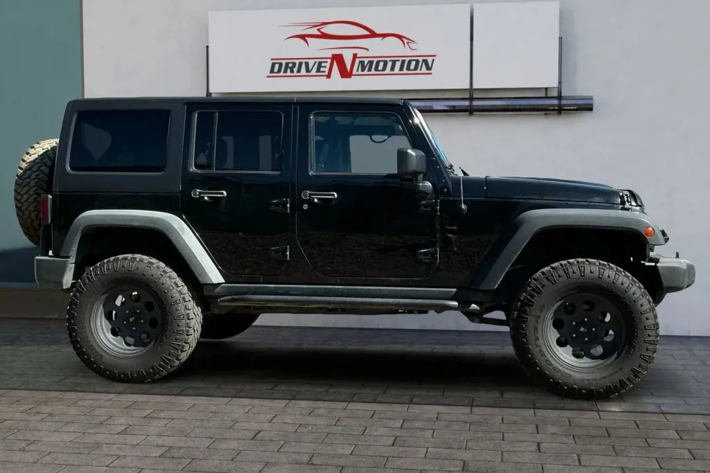 Another view of 2014 Jeep Wrangler Unlimited Rubicon Sport Utility 4D for sale in Greeley, CO at Drive N-Motion Greeley