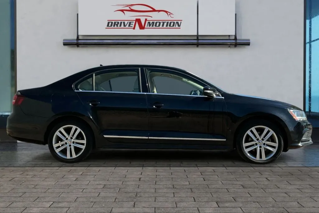 Another view of 2017 Volkswagen Jetta 1.8T SEL Sedan 4D for sale in Greeley, CO at Drive N-Motion Greeley