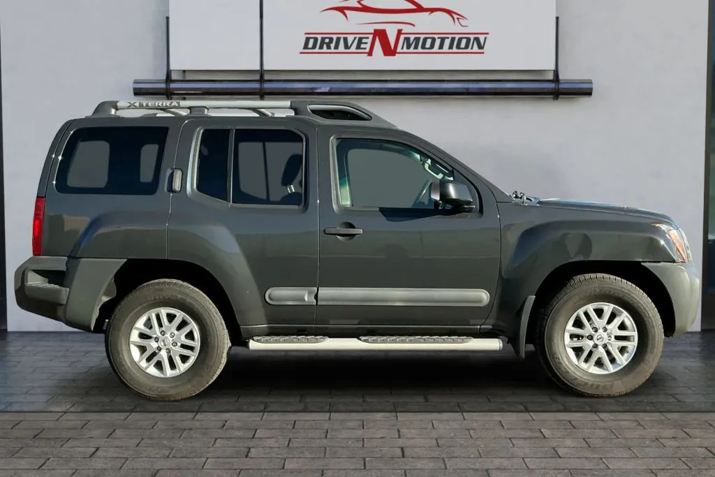 Another view of 2014 Nissan Xterra S Sport Utility 4D for sale in Greeley, CO at Drive N-Motion Greeley