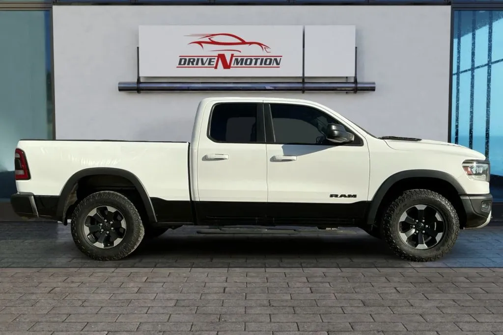 Photos of 2019 Ram 1500 Quad Cab Rebel Pickup 4D 6 1/3 ft for sale in Greeley, CO at Drive N-Motion Greeley