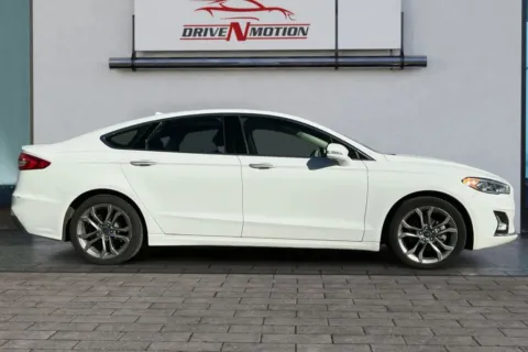 Photos of 2020 Ford Fusion Titanium Hybrid Sedan 4D for sale in Greeley, CO at Drive N-Motion Greeley