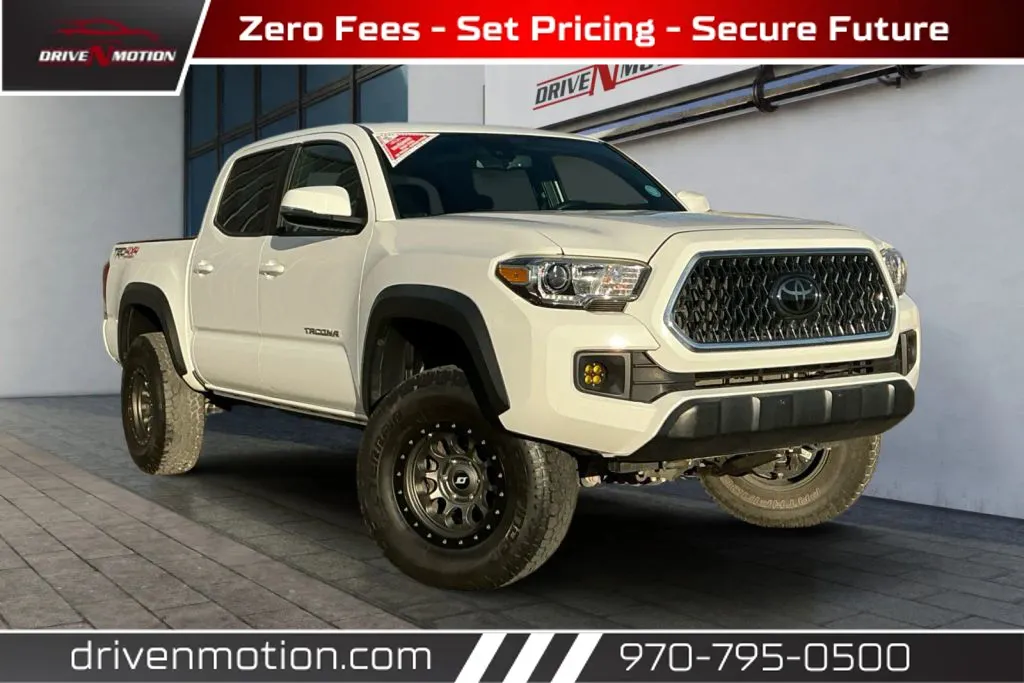 White 2019 Toyota Tacoma Double Cab TRD Off-Road Pickup 4D 5 ft for sale in Greeley, CO