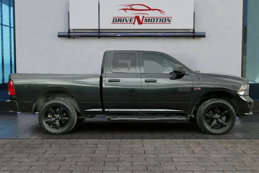 Another view of 2016 Ram 1500 Quad Cab Express Pickup 4D 6 1/3 ft for sale in Greeley, CO at Drive N-Motion Greeley