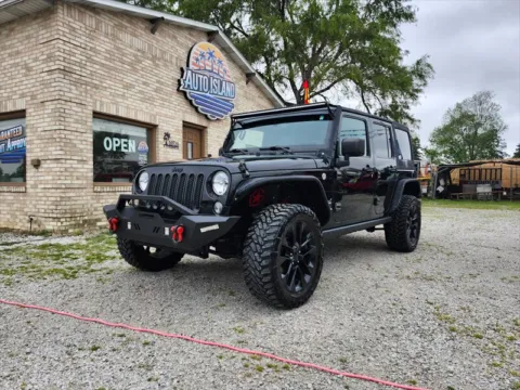 Black 2016 Jeep Wrangler Unlimited Sport S for sale in Wanatah, IN